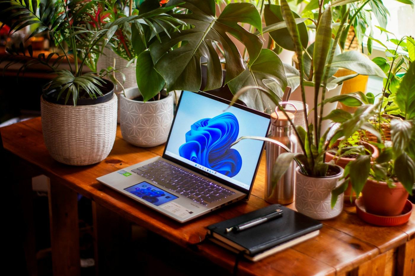 A laptop on a wooden desk